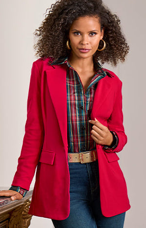 Models wearing a plaid button up, red blazer and medium wash denim.